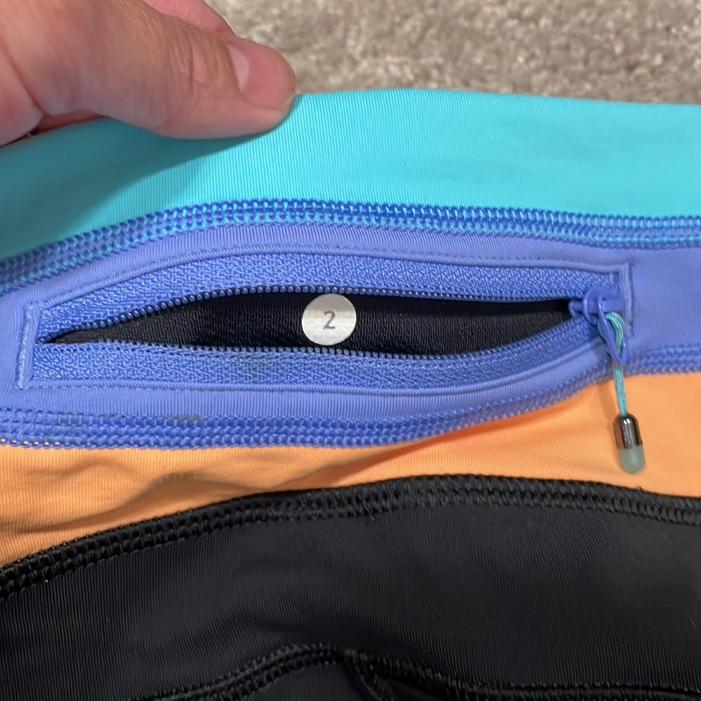 Size 2 Lululemon black pants with side pockets. - Picture 3 of 5